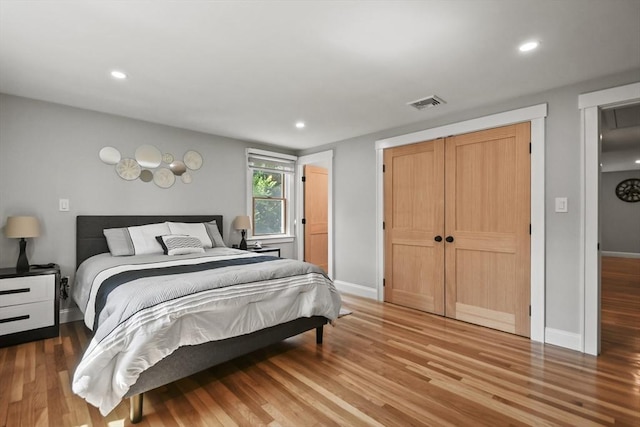 8 Longbow Cir, Lynnfield, MA 01940 - bedroom featuring light wood finished floors, baseboards, recessed lighting, and a closet