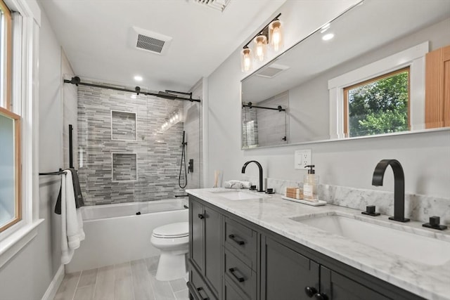 8 Longbow Cir, Lynnfield, MA 01940 - full bathroom featuring toilet, double vanity, bathing tub / shower combination, and recessed lighting