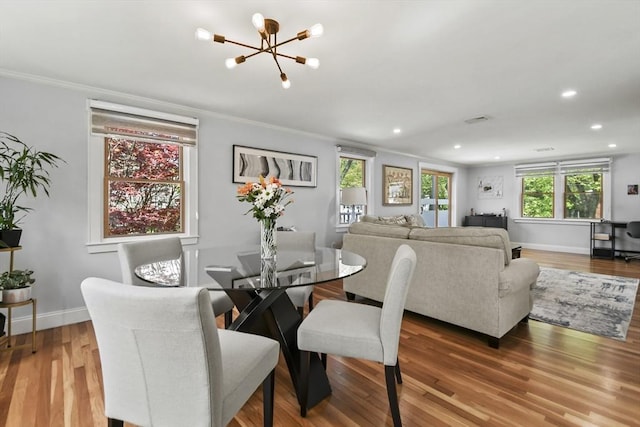 8 Longbow Cir, Lynnfield, MA 01940 - dining area featuring a chandelier, wood finished floors, recessed lighting, crown molding, and baseboards