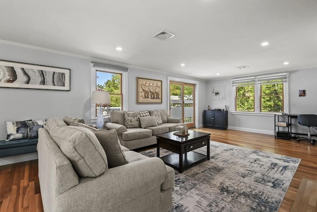 8 Longbow Cir, Lynnfield, MA 01940 - living area with ornamental molding, wood finished floors, recessed lighting, and baseboards