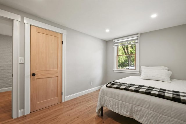 8 Longbow Cir, Lynnfield, MA 01940 - bedroom with light wood-style flooring, baseboards, and recessed lighting
