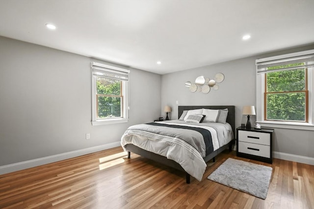8 Longbow Cir, Lynnfield, MA 01940 - bedroom with multiple windows, baseboards, wood finished floors, and recessed lighting