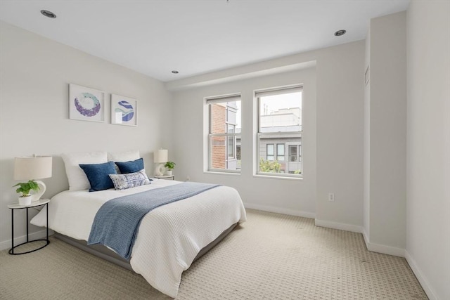 16 Miner St Unit 506, Boston, MA 02215 - bedroom with light carpet, baseboards, and recessed lighting