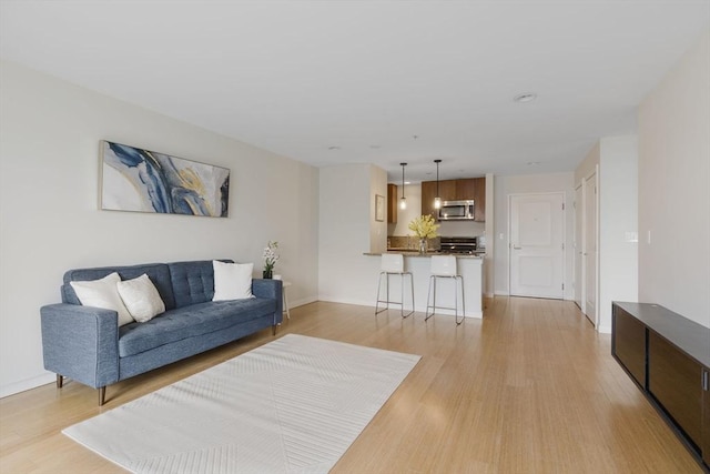16 Miner St Unit 506, Boston, MA 02215 - living room featuring light wood-type flooring and baseboards