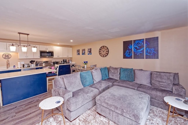 living room featuring light wood-style floors