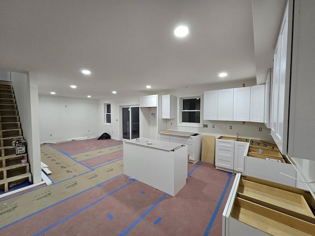 kitchen featuring white cabinetry and a center island