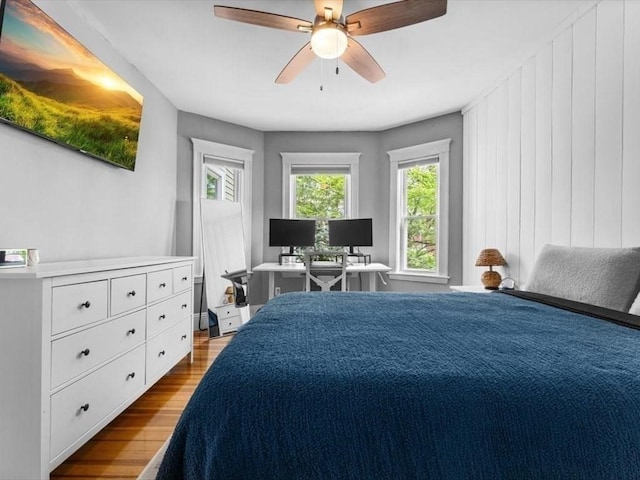 29 Chelmsford St Unit 2, Boston, MA 02122 - bedroom with wood finished floors, an office area, and a ceiling fan
