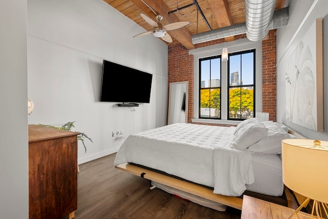 bedroom with wood ceiling, ceiling fan, beamed ceiling, hardwood / wood-style flooring, and brick wall