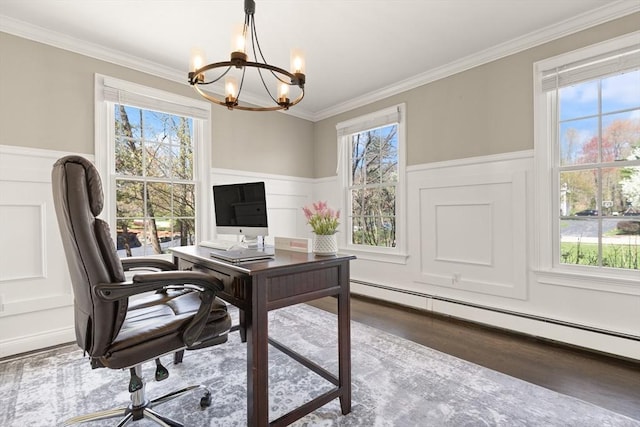 office with wainscoting, wood finished floors, a baseboard radiator, a notable chandelier, and a decorative wall