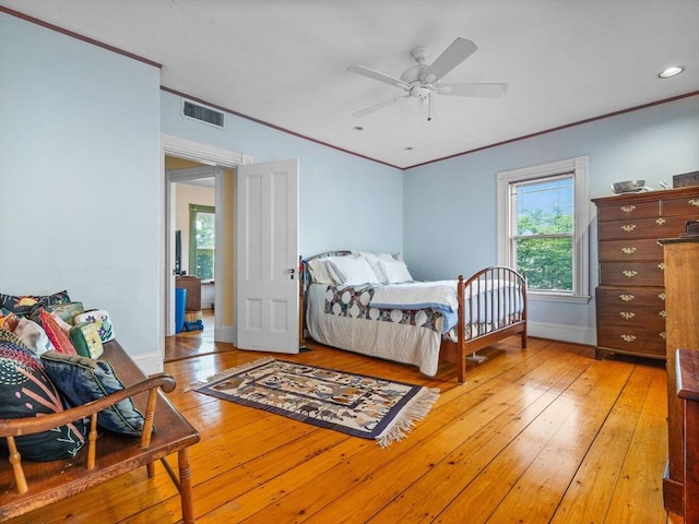 10 John A Andrew St, Boston, MA 02130 - bedroom with crown molding, light wood finished floors, baseboards, ceiling fan, and recessed lighting