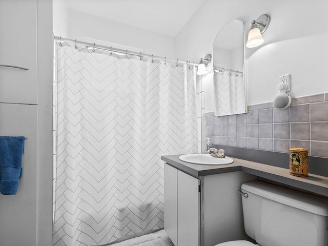 10 John A Andrew St, Boston, MA 02130 - bathroom with vanity, tile walls, toilet, and curtained shower