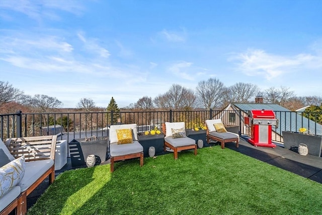 view of yard featuring fence and an outdoor hangout area