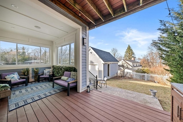 deck with a lawn, fence private yard, and outdoor lounge area