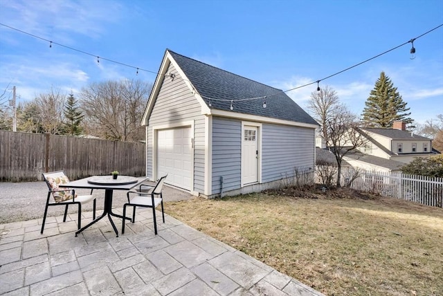 detached garage with fence