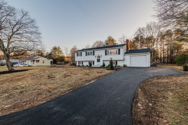 raised ranch with a garage