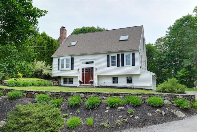 59 Davis St, Northborough, MA 01532 - bi-level home featuring a chimney and roof with shingles