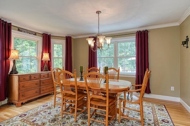 59 Davis St, Northborough, MA 01532 - dining room featuring a chandelier, light wood-type flooring, and ornamental molding