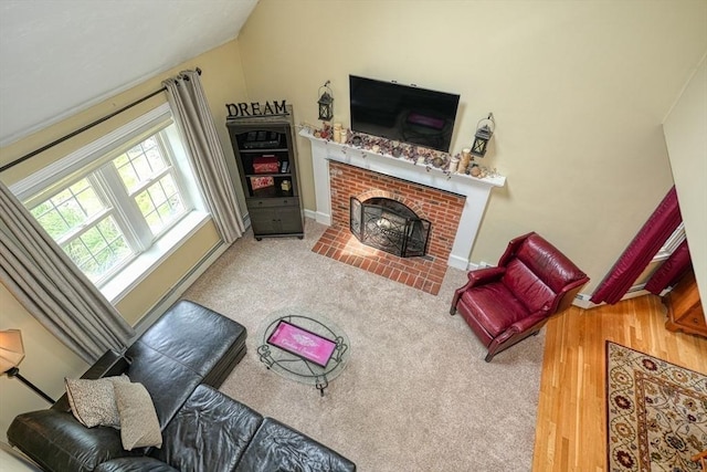 59 Davis St, Northborough, MA 01532 - living room featuring a brick fireplace and baseboards