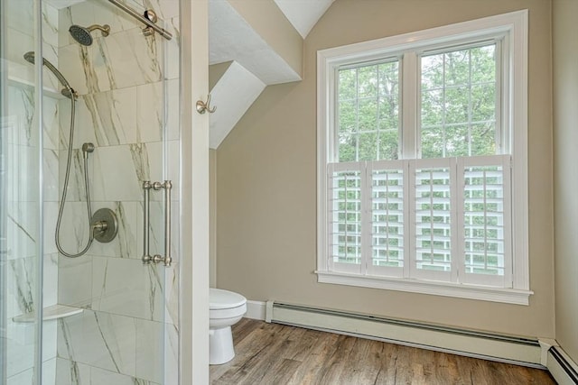 59 Davis St, Northborough, MA 01532 - full bath featuring a baseboard radiator, plenty of natural light, lofted ceiling, a marble finish shower, and wood finished floors