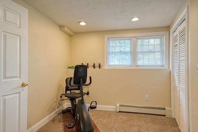 59 Davis St, Northborough, MA 01532 - exercise room featuring a baseboard radiator, carpet floors, and recessed lighting