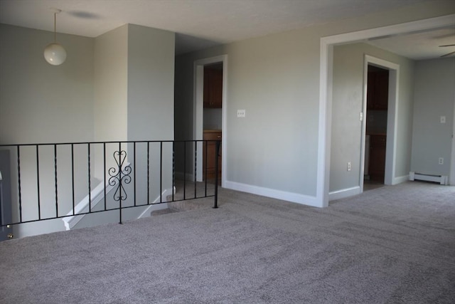 11 Skyview Ln, Woburn, MA 01801 - carpeted spare room featuring a baseboard radiator and baseboards