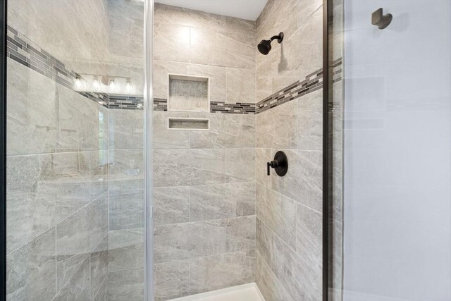 bathroom with an enclosed shower