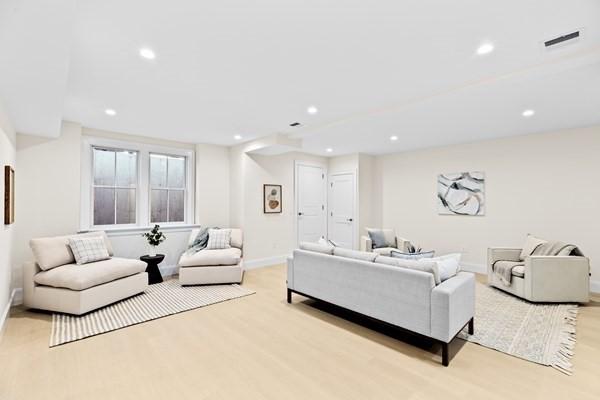 32 Kingsbury St Unit 1, Wellesley, MA 02481 - living area with light wood-type flooring and recessed lighting