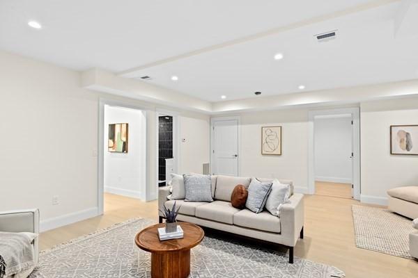 32 Kingsbury St Unit 1, Wellesley, MA 02481 - living room featuring light wood-style floors and recessed lighting