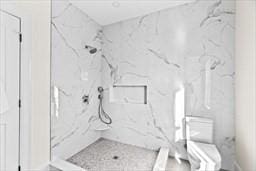 32 Kingsbury St Unit 1, Wellesley, MA 02481 - bathroom featuring a marble finish shower and toilet