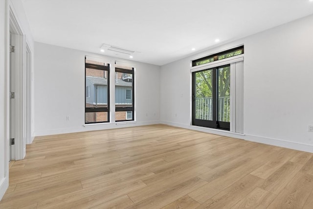 1948-1950 Washington St Unit 3E, Boston, MA 02118 - spare room featuring light wood-type flooring, recessed lighting, and baseboards