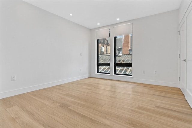 1948-1950 Washington St Unit 3E, Boston, MA 02118 - empty room featuring light wood finished floors, baseboards, and recessed lighting
