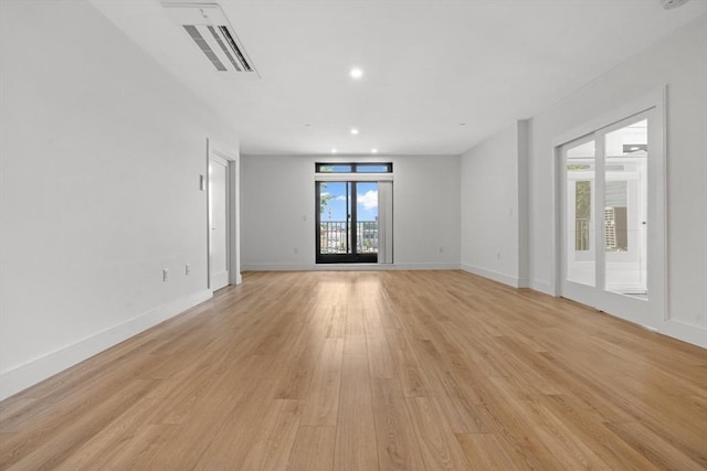 1948-1950 Washington St Unit 3E, Boston, MA 02118 - spare room with light wood-type flooring, baseboards, and recessed lighting