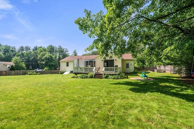 23 Redbird Rd, Wrentham, MA 02093 - fenced backyard with a deck