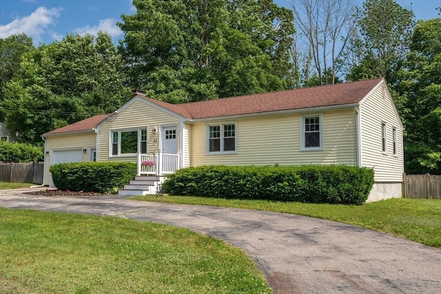23 Redbird Rd, Wrentham, MA 02093 - ranch-style house with an attached garage, asphalt driveway, and a chimney