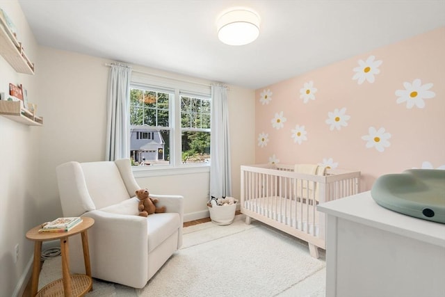 23 Redbird Rd, Wrentham, MA 02093 - bedroom with wallpapered walls and a nursery area