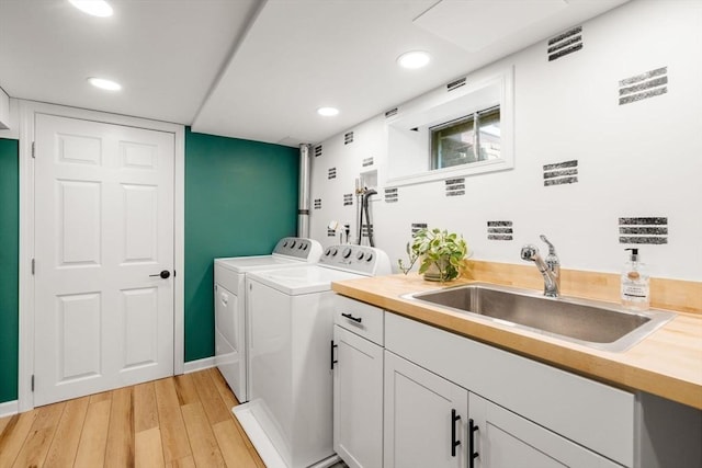 23 Redbird Rd, Wrentham, MA 02093 - washroom featuring separate washer and dryer, light wood-style flooring, and recessed lighting