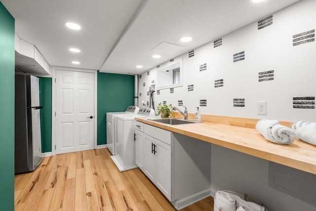 23 Redbird Rd, Wrentham, MA 02093 - washroom with washing machine and clothes dryer, recessed lighting, and light wood finished floors