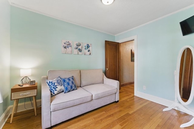 96 Craiwell Ave, West Springfield, MA 01089 - living area with crown molding, wood finished floors, and baseboards