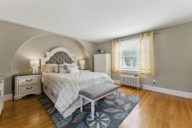 96 Craiwell Ave, West Springfield, MA 01089 - bedroom featuring radiator heating unit, baseboards, and wood finished floors
