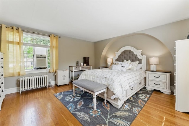 96 Craiwell Ave, West Springfield, MA 01089 - bedroom with radiator heating unit, wood finished floors, and baseboards