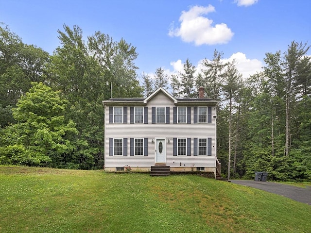 1056 Alger St, Winchendon, MA 01475 - colonial inspired home featuring a chimney, a front yard, and entry steps
