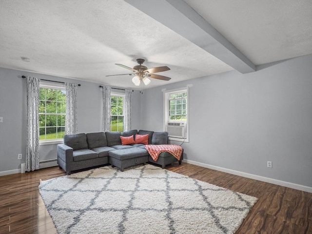 1056 Alger St, Winchendon, MA 01475 - living room with wood finished floors, ceiling fan, cooling unit, a baseboard radiator, and a textured ceiling