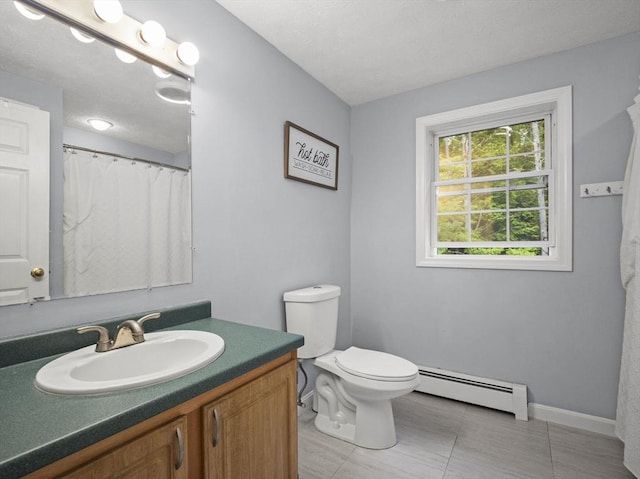 1056 Alger St, Winchendon, MA 01475 - full bathroom with a baseboard radiator, vanity, and tile patterned flooring