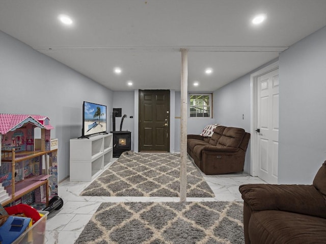 1056 Alger St, Winchendon, MA 01475 - living room with marble finish floors, recessed lighting, and a wood stove