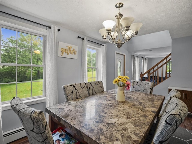 1056 Alger St, Winchendon, MA 01475 - dining area featuring a baseboard heating unit, a chandelier, stairs, wood finished floors, and a textured ceiling