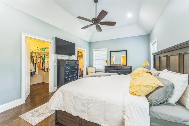19 Crystal Cir, Tewksbury, MA 01876 - bedroom with lofted ceiling, a walk in closet, dark wood-style floors, a ceiling fan, and a closet