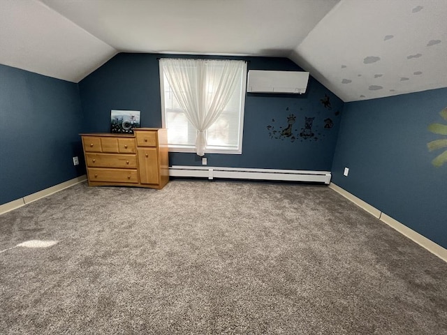 bonus room featuring a wall mounted AC, a baseboard heating unit, vaulted ceiling, carpet floors, and baseboards
