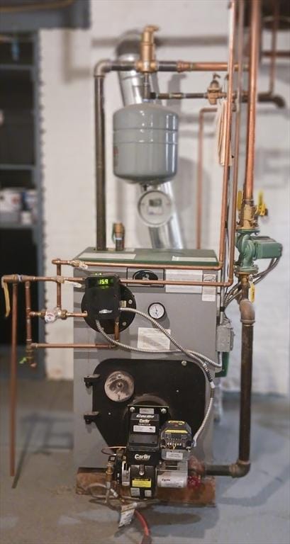utility room with a heating unit