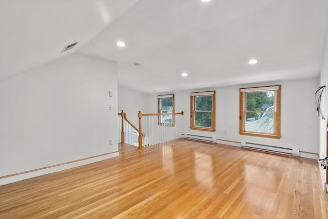 80 Joyce Kilmer Rd, Boston, MA 02132 - unfurnished living room with a baseboard radiator, light wood-type flooring, recessed lighting, and lofted ceiling