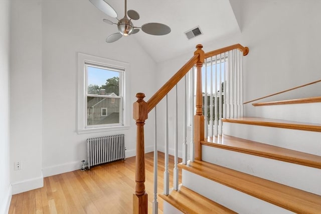 80 Joyce Kilmer Rd, Boston, MA 02132 - stairway featuring radiator, wood finished floors, a ceiling fan, and vaulted ceiling